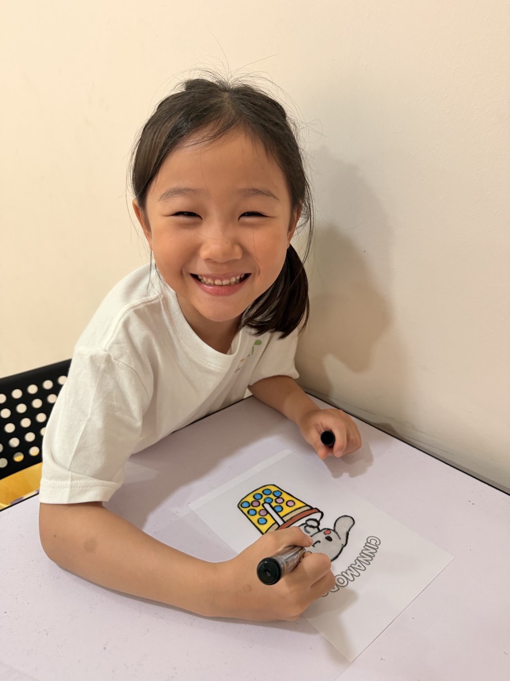 A Pebbles student enjoying art activity